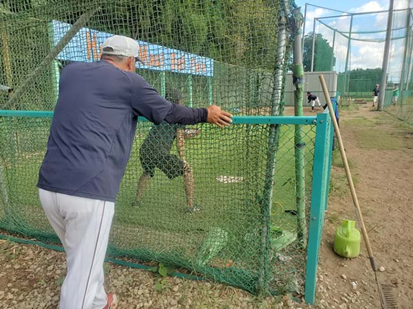 監督の背中