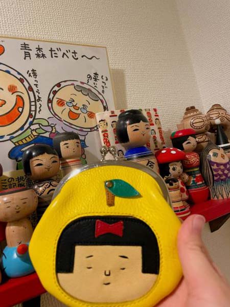 黄色のがま口
